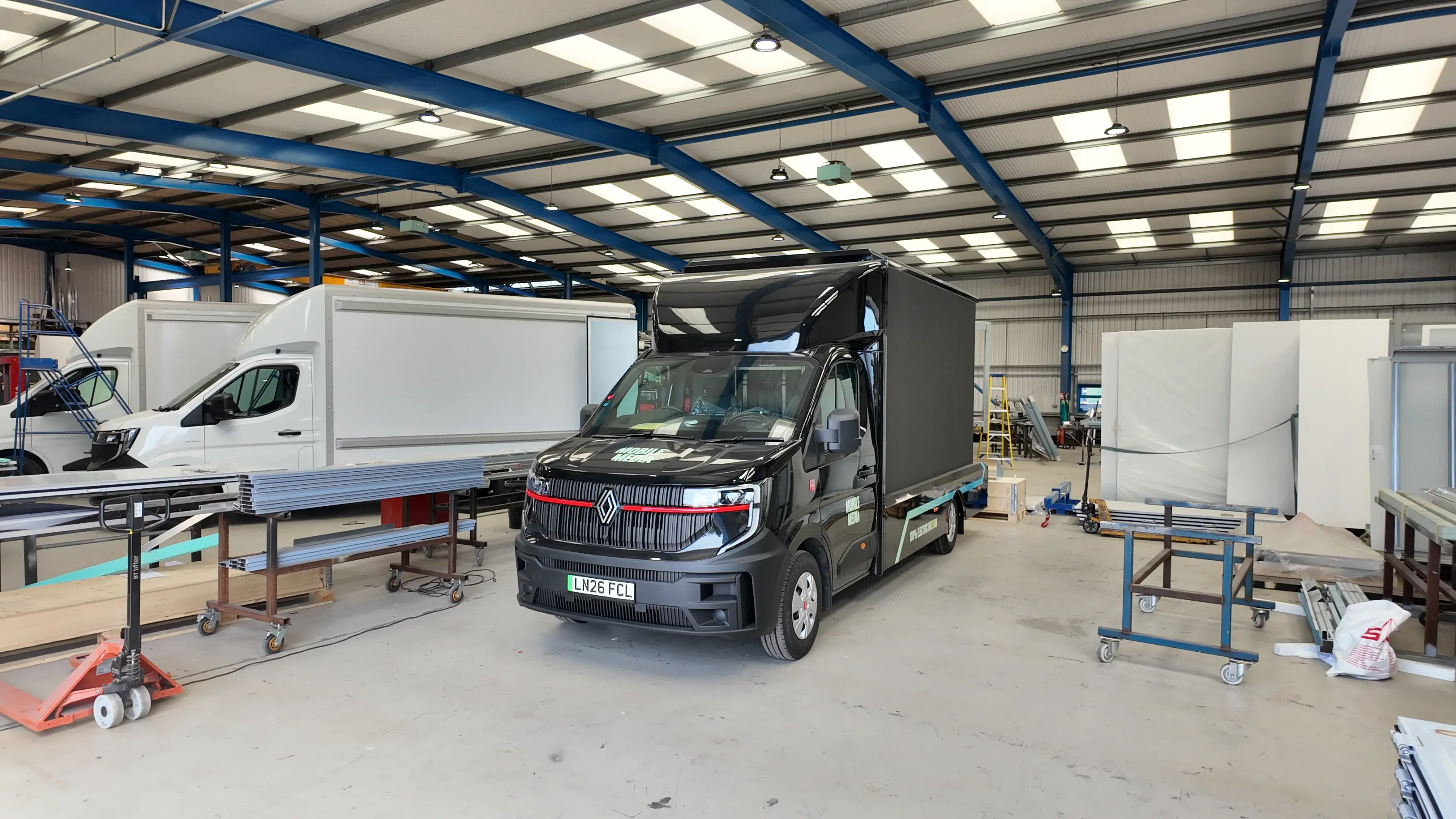 Horton Commercials Builds Bespoke Electric DigEVans for Mobile Media